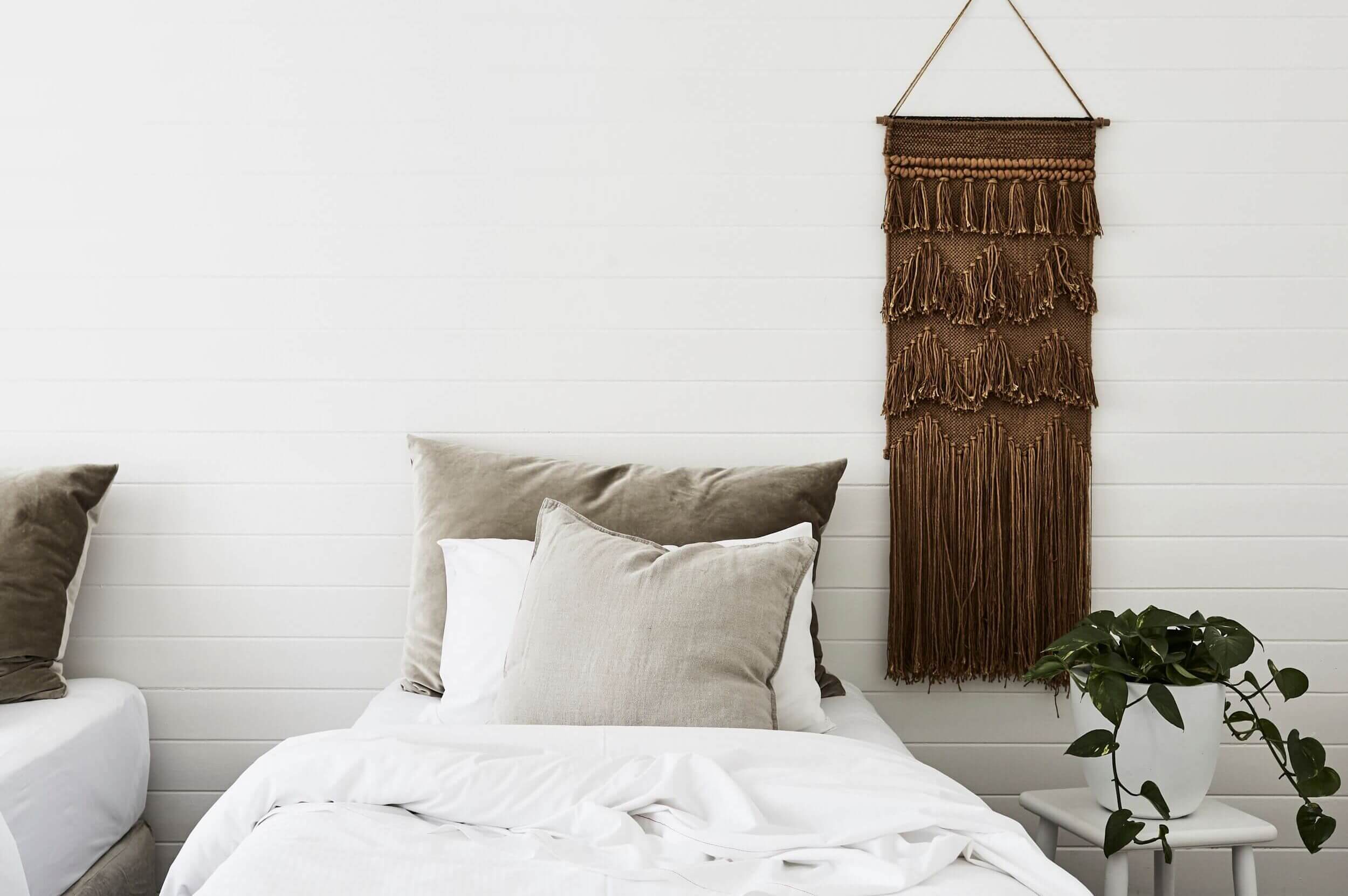 Woven wall hanging in bedroom at Bower Cottage, The Bower Byron Bay