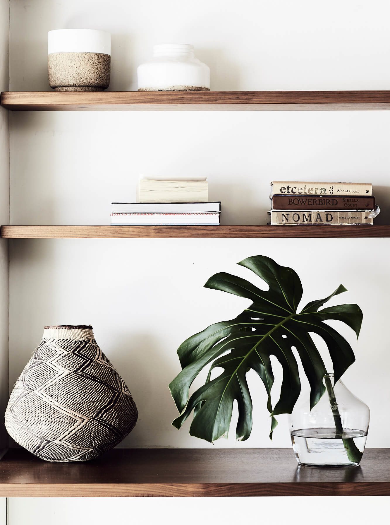 Open wall shelves with decorative pieces on displayat The Villas of Byron