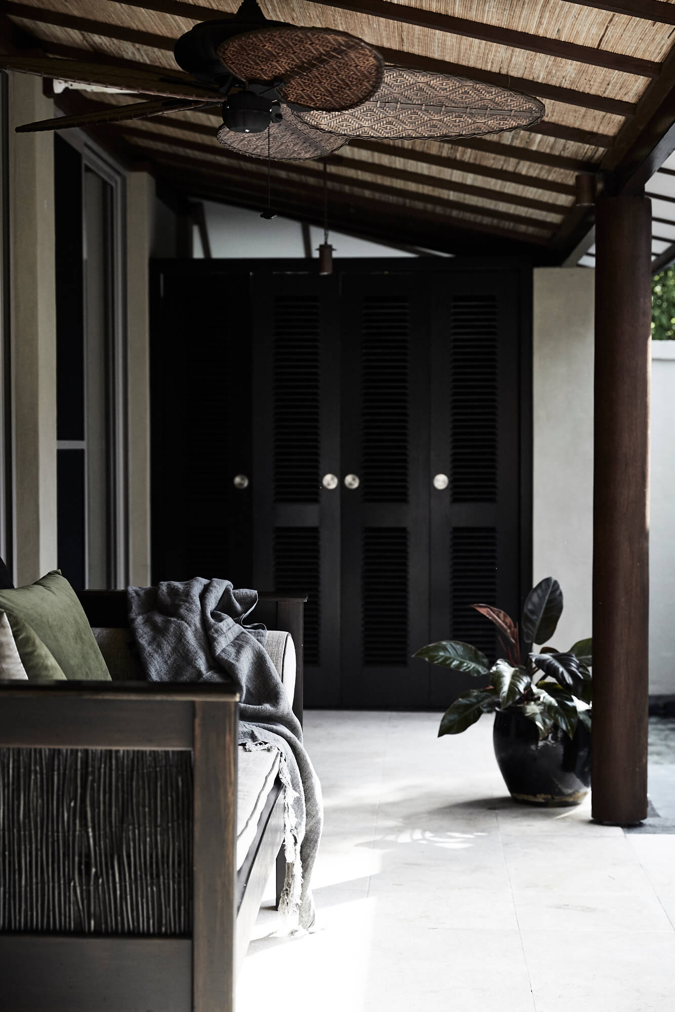 Plush daybed on undercover verandah at The Villas of Byron