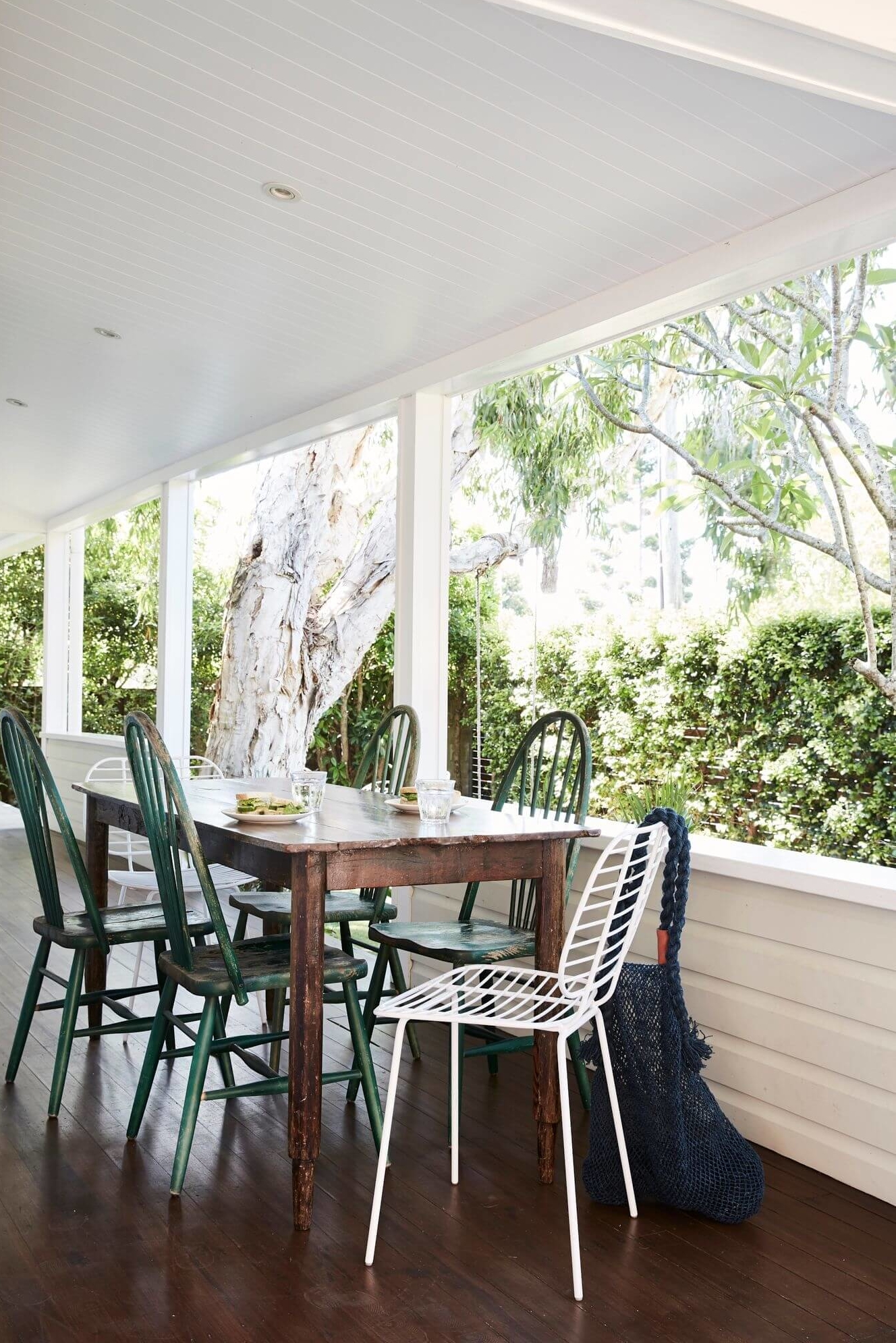 Outdoor dining on undercover verandah at The Cottage, Byron Beach Abodes