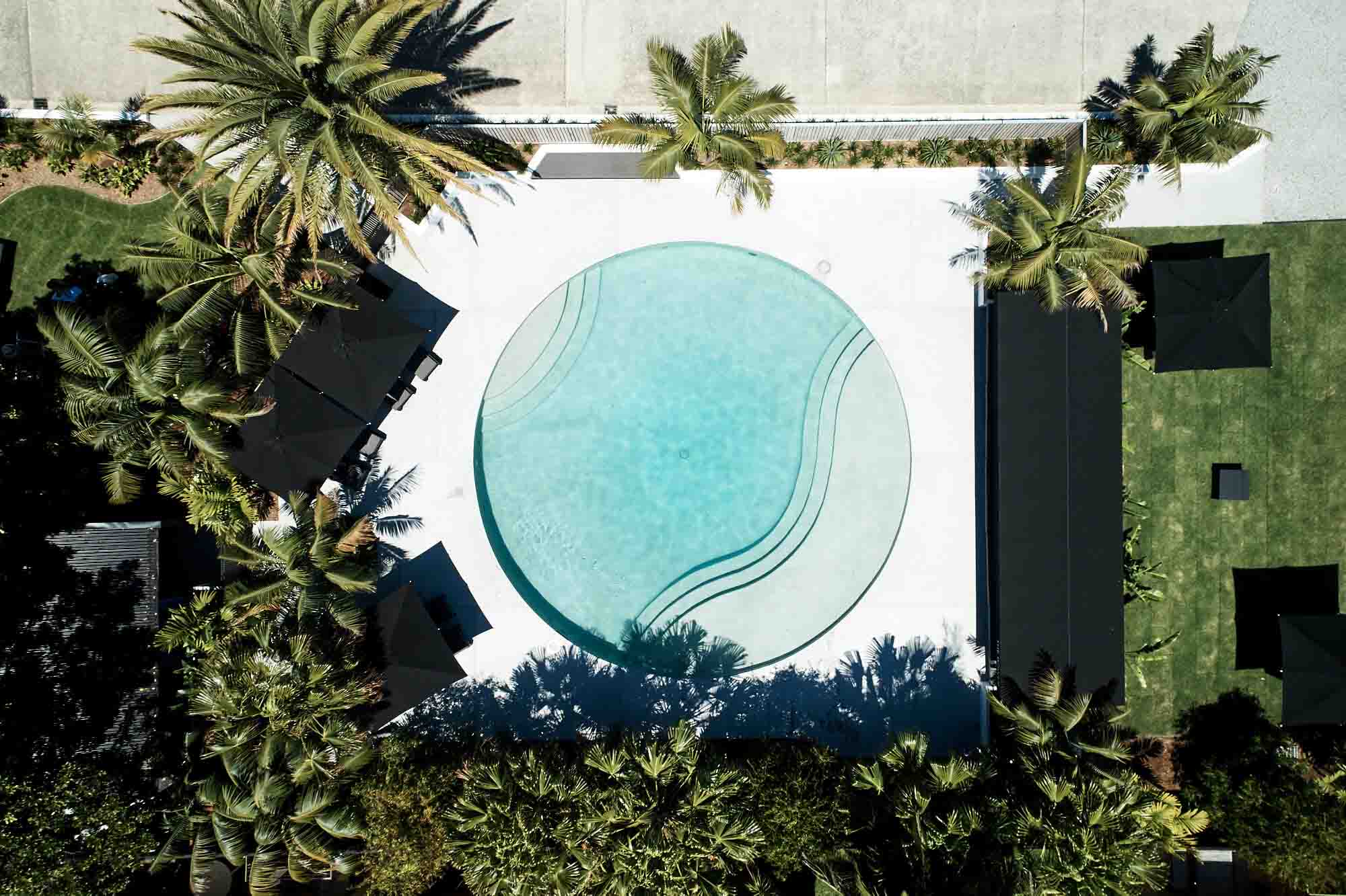 Aerial view of the round pool at The Bower Byron Bay