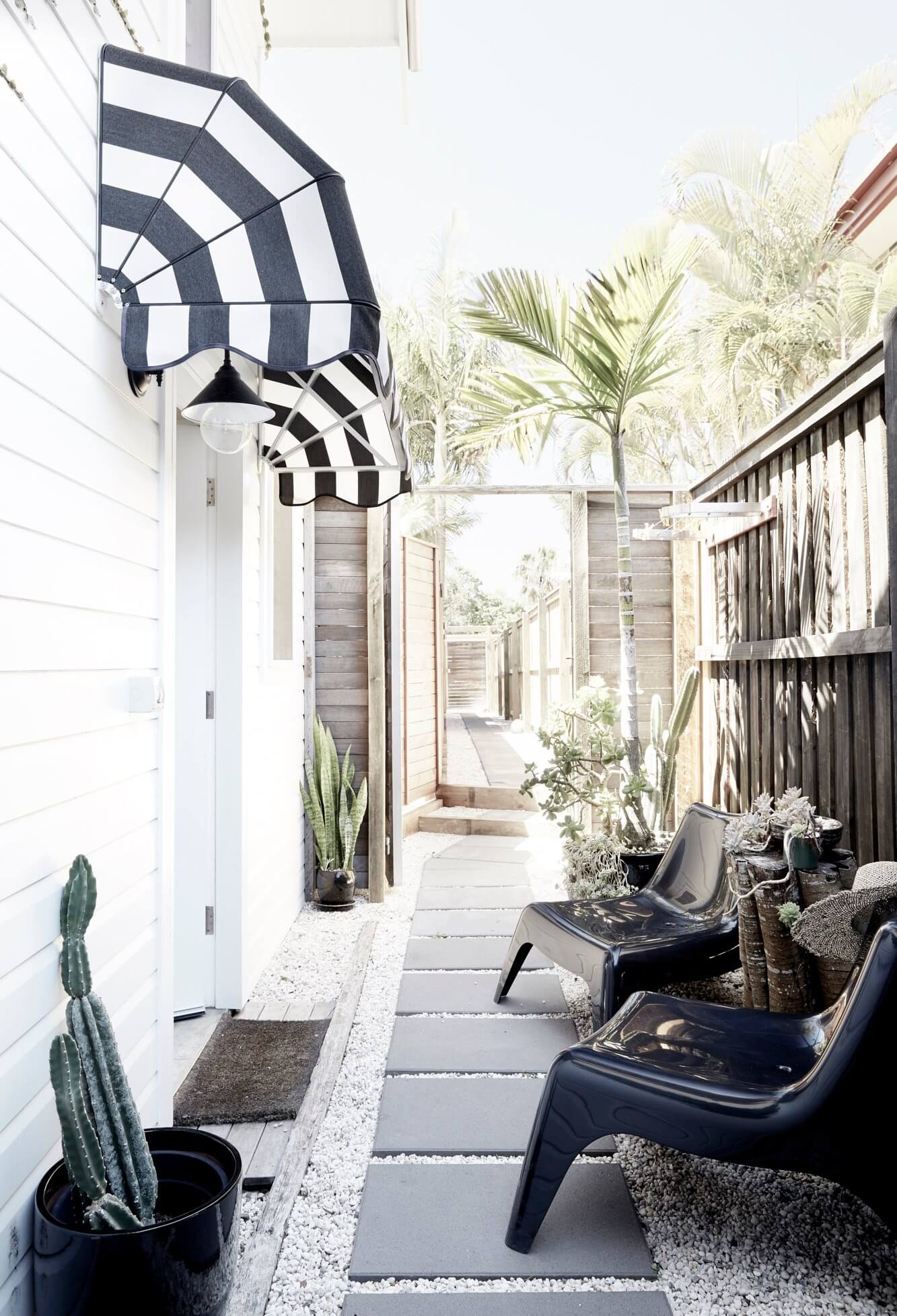 Black and white striped awnings at the entrance to The Chapel, Byron Beach Abodes