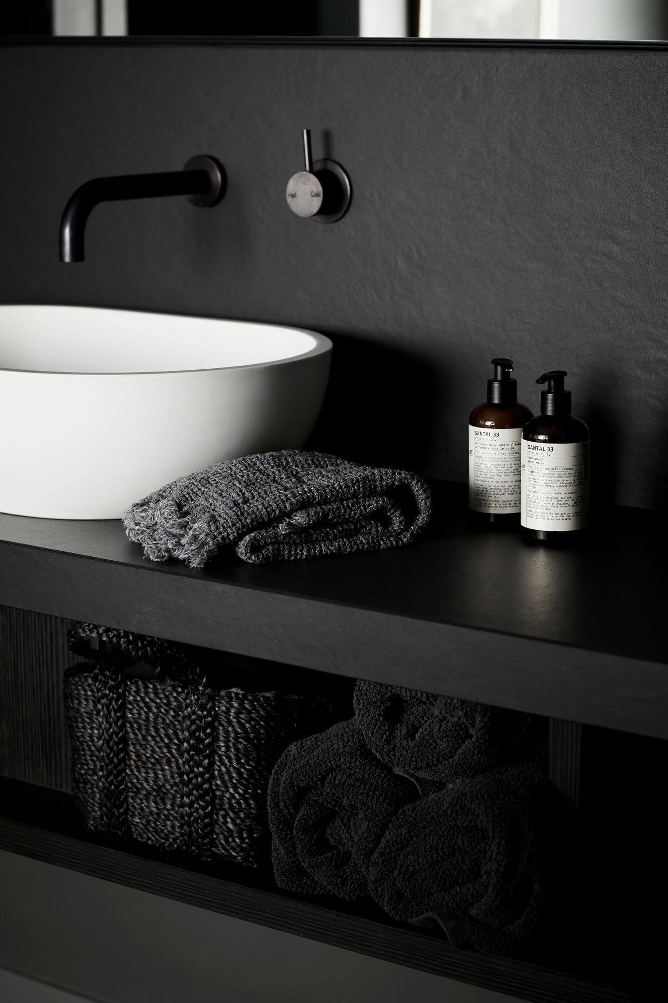 Custom black joinery with white ceramic vanity bowl at the Bower Studios, The Bower Byron Bay hotel