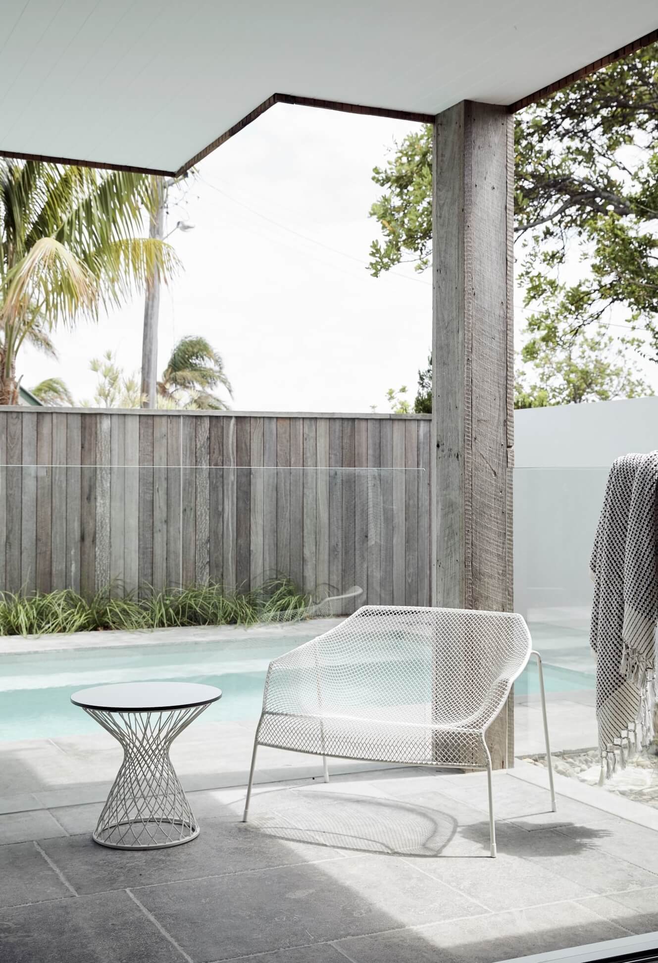 Eco Outdoor chair poolside at The Lodge, Byron Beach Abodes